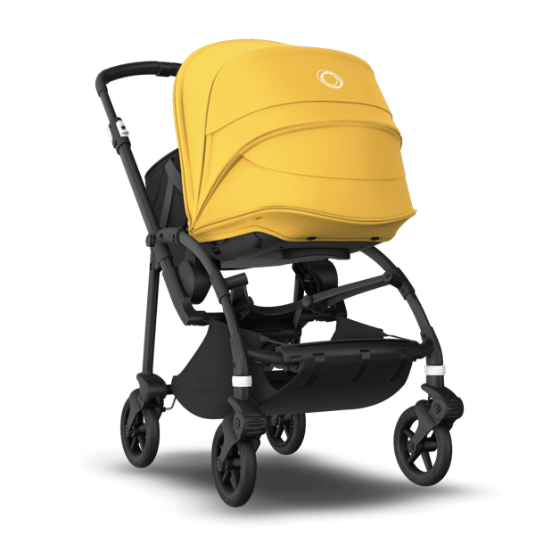 Bugaboo Bee 6 stroller with bassinet and yellow sun canopy.